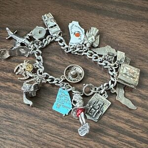 Charming Sterling Silver Silver Bracelet with Travel Charms